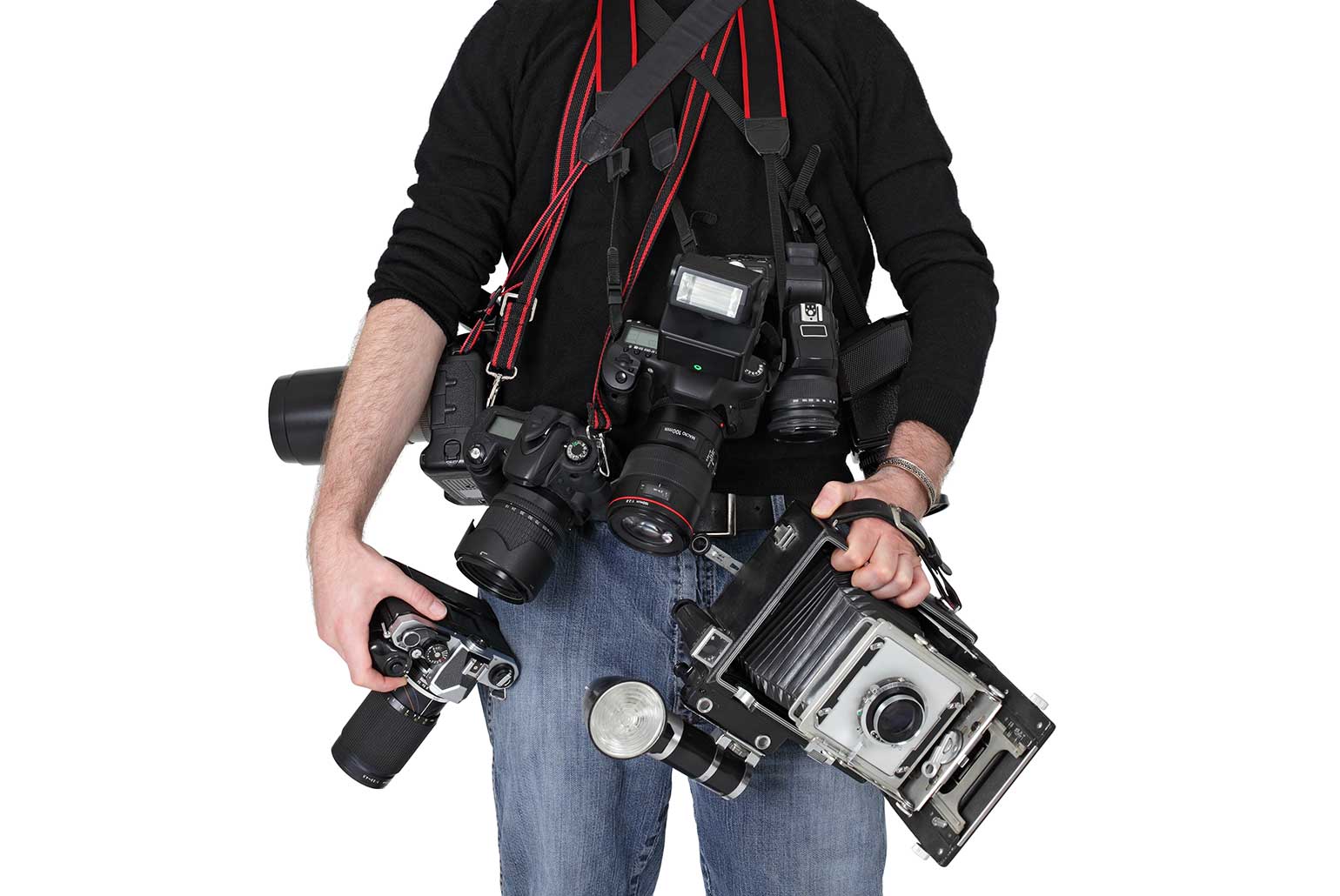Personne portant plusieurs appareils photo de différents types et tailles