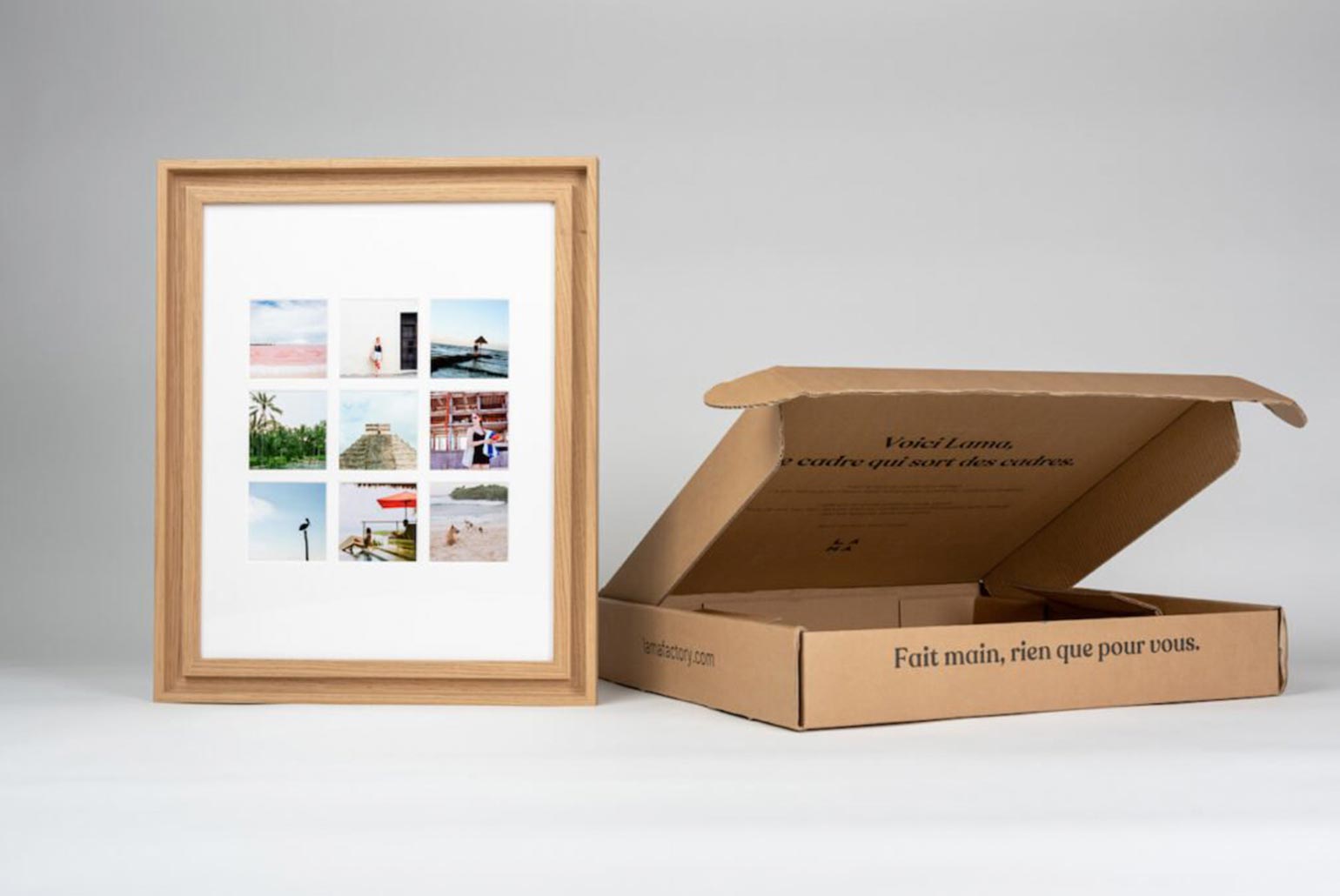 Cadre en bois avec neuf petites photos à côté d'une boîte ouverte en carton.